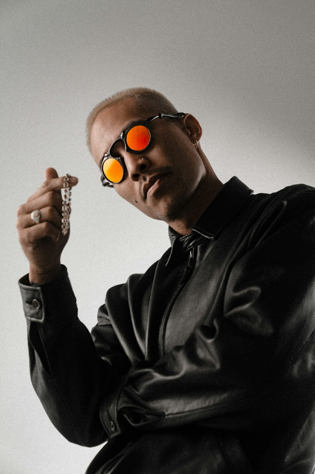 Studio portrait of a man with glasses